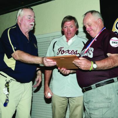 Roy Hobbs President Tom Giffen presenting Dick Kissik’s Hall of Fame plaque to Dick’s nephew Glenn Wilcox